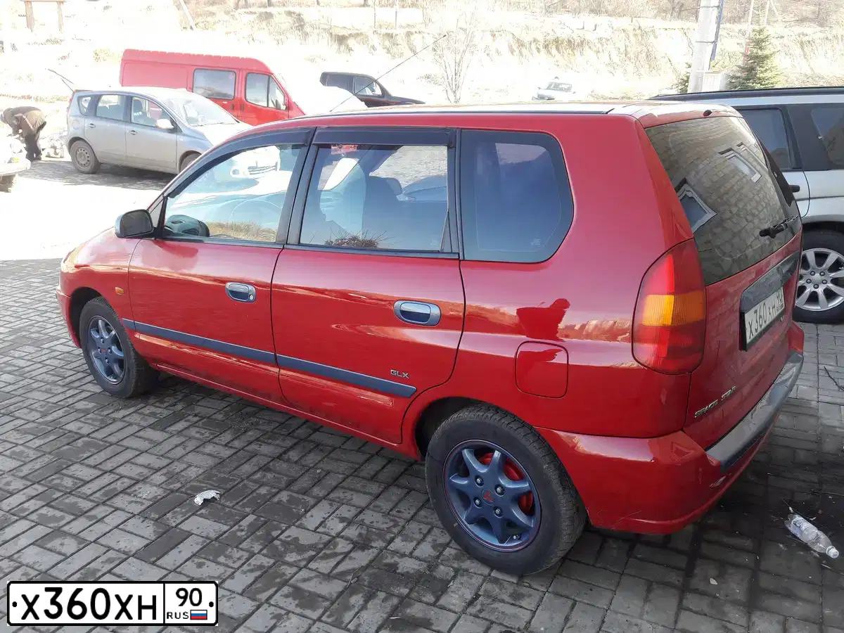 Фото автомобиля MITSUBISHI SPACE STAR, 1999 — госномер Н117АТ181. Цвет: Красный