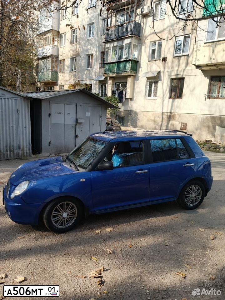 Фото автомобиля LIFAN SMILY, 2011 — госномер А506МТ01. Цвет: синий