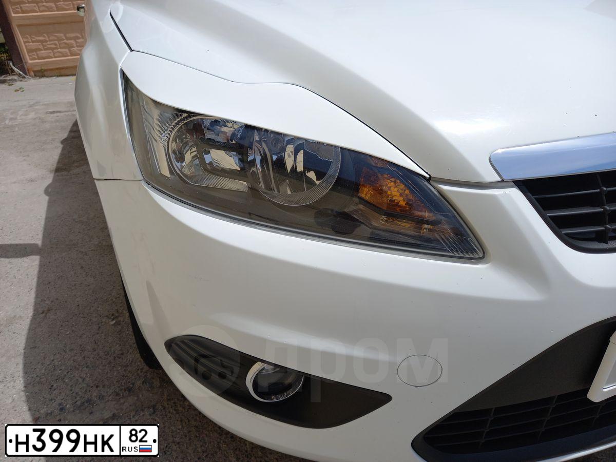 Фото автомобиля FORD FOCUS, 2010 — госномер Т934ТЕ193. Цвет: Белый