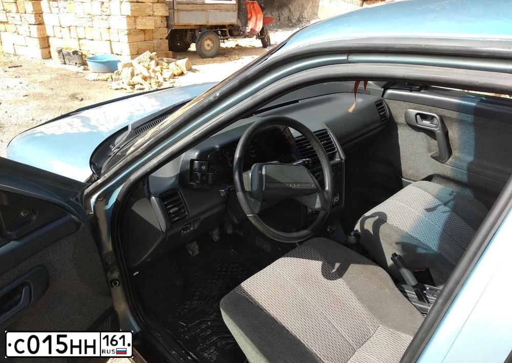 Фото автомобиля LADA 2112, 2003 — госномер С013НН161. Цвет: СЕРЫЙ