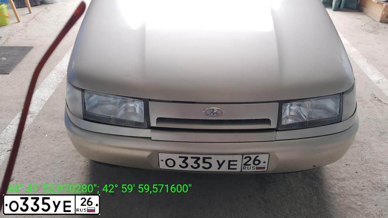Фото автомобиля LADA 2112, 2000 — госномер О335УЕ26. Цвет: СЕРЕБРИСТО-ЗОЛОТОЙ