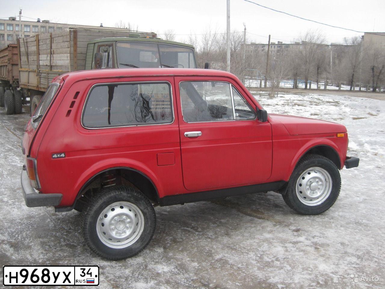 Фото автомобиля LADA 2121 NIVA, 1994 — госномер Н968УХ34. Цвет: КРАСНЫЙ