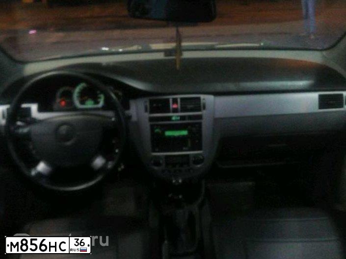 Фото автомобиля CHEVROLET LACETTI, 2007 — госномер К034СХ123. Цвет: БЕЖЕВЫЙ