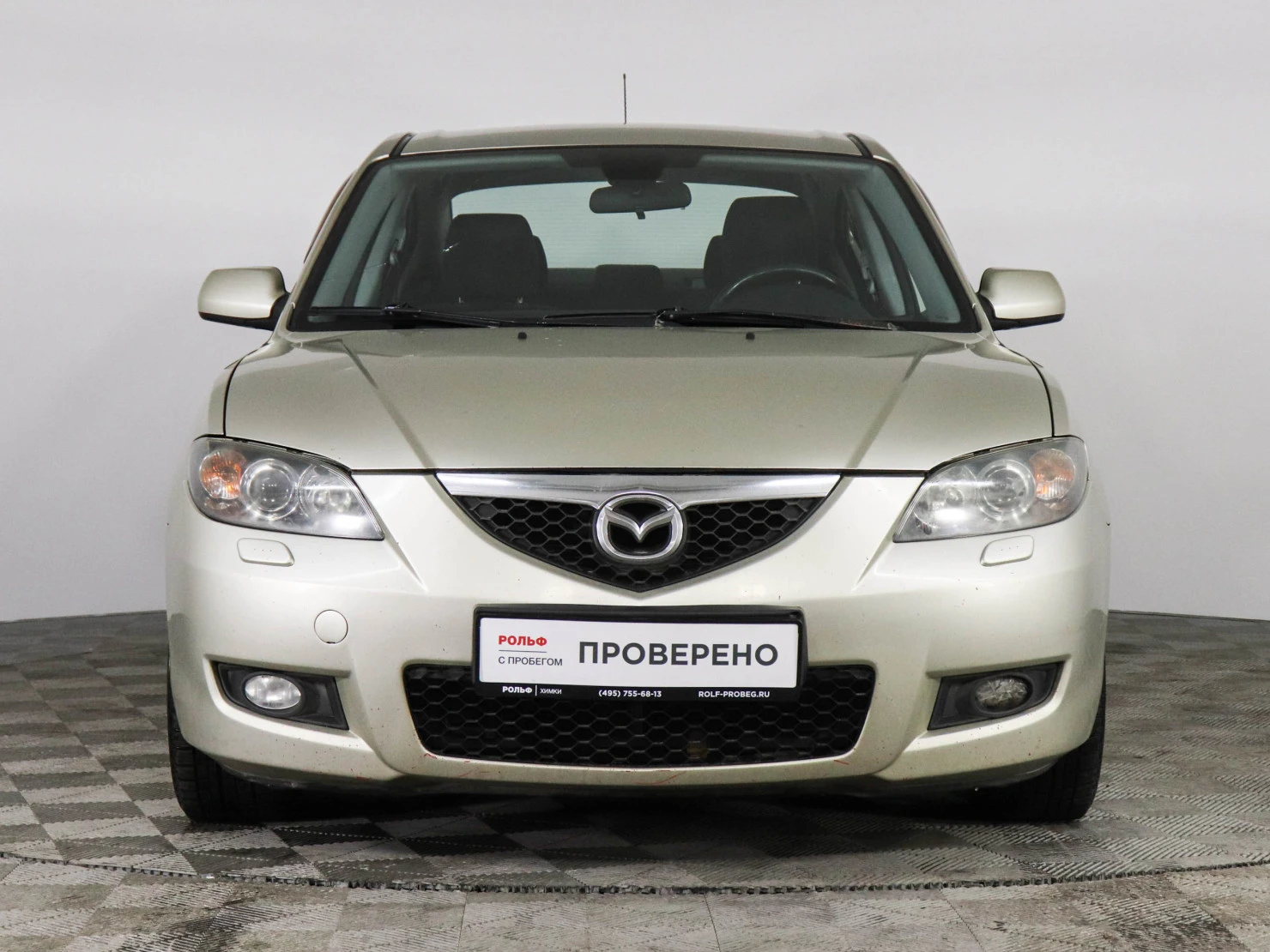 Фото автомобиля MAZDA 3, 2007 — госномер У305АХ199. Цвет: ЗОЛОТИСТЫЙ