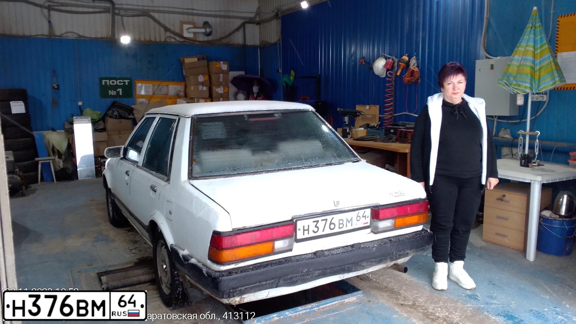 Фото автомобиля MAZDA A 323, 1983 — госномер Н376ВМ64. Цвет: Белый