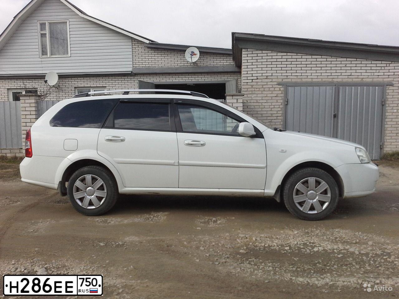 Фото автомобиля CHEVROLET LACETTI, 2011 — госномер Н286ЕЕ750. Цвет: БЕЛЫЙ