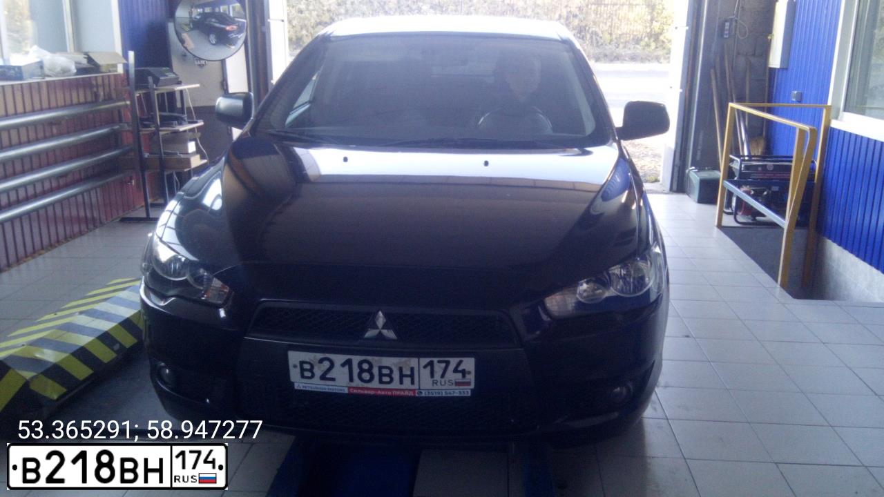 Фото автомобиля MITSUBISHI LANCER, 2008 — госномер В218ВН174. Цвет: ЧЕРНЫЙ