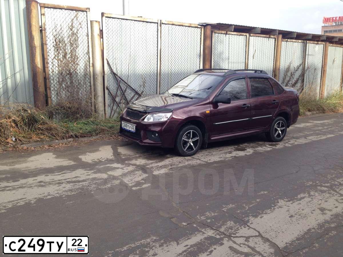 Фото автомобиля LADA 2190 GRANTA, 2012 — госномер С249ТУ22. Цвет: ТЕМНО-ВИШНЕВЫЙ
