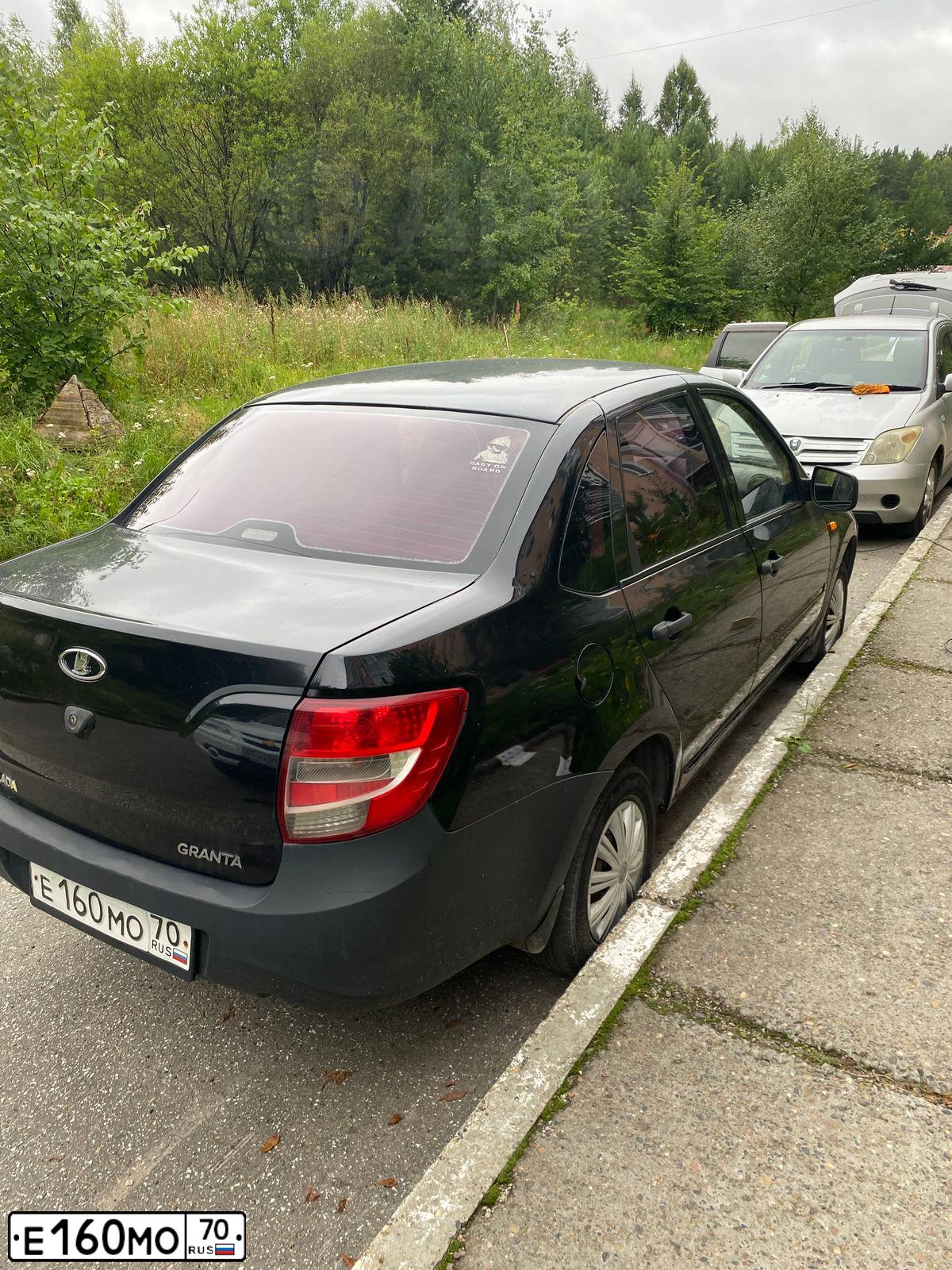 Фото автомобиля LADA 2190 GRANTA, 2012 — госномер Е421ОА122. Цвет: серебристо-коричневый