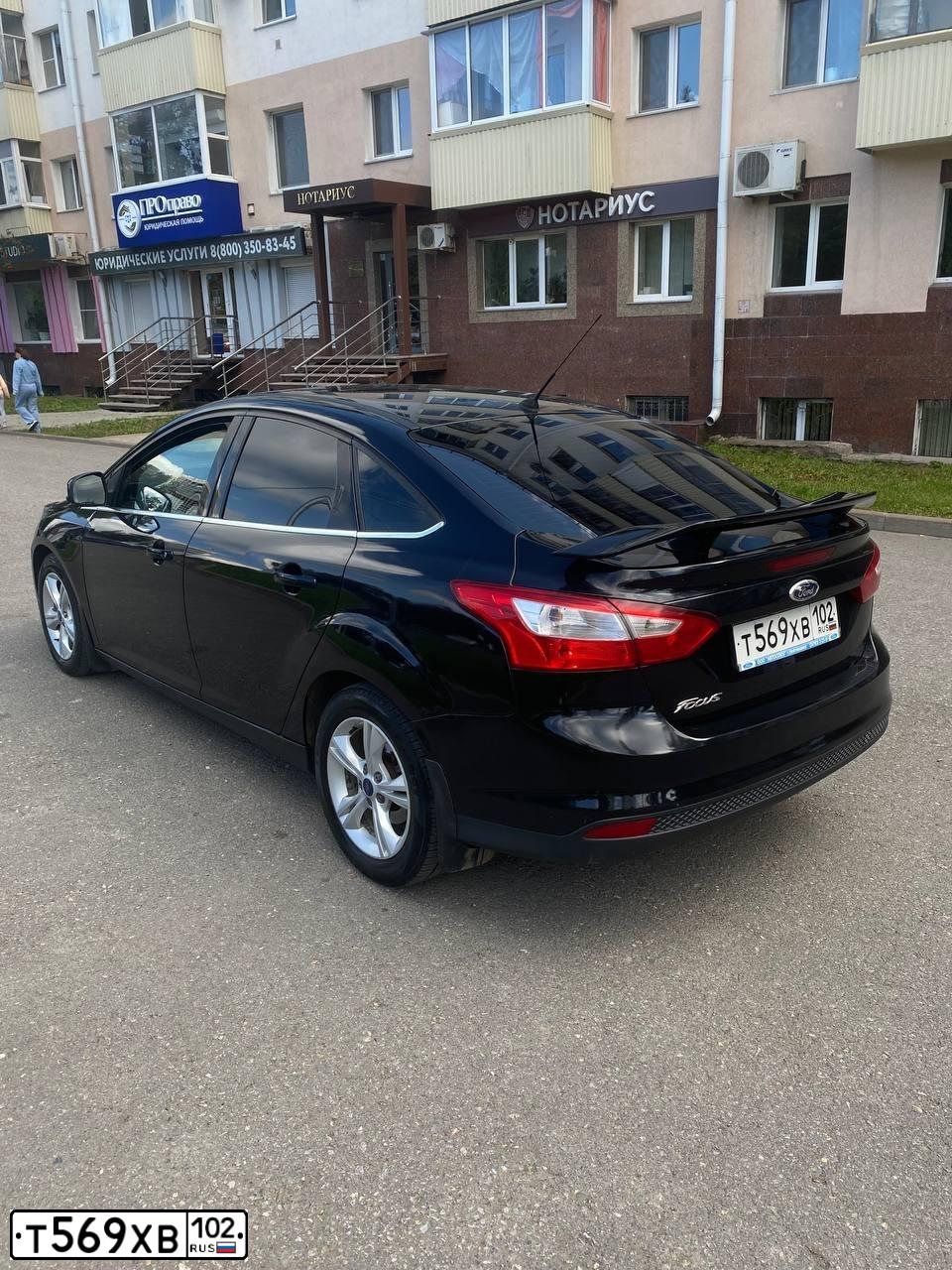 Фото автомобиля FORD FOCUS, 2011 — госномер Т569ХВ102. Цвет: ЧЕРНЫЙ