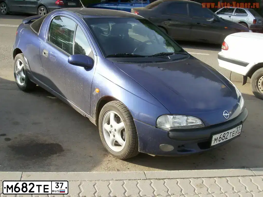 Фото автомобиля OPEL TIGRA, 1996 — госномер М682ТЕ37. Цвет: СИНИЙ