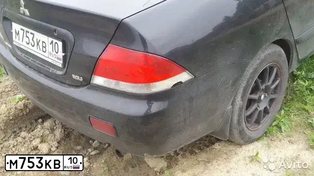 Фото автомобиля MITSUBISHI LANCER, 2005 — госномер М283РК10. Цвет: ЧЕРНЫЙ