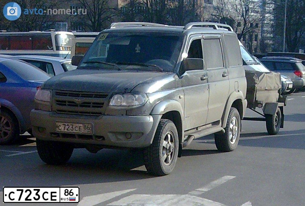 Фото автомобиля UAZ 3163 PATRIOT, 2007 — госномер М796МС154. Цвет: ЧЕРНЫЙ МЕТАЛЛИК