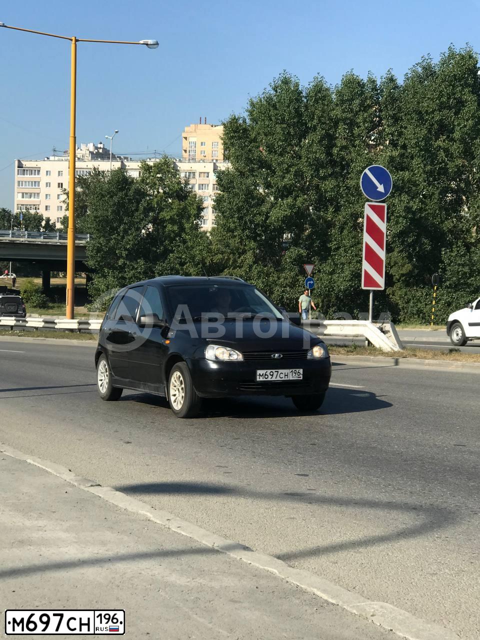 Фото автомобиля LADA 1119 KALINA, 2011 — госномер М697СН196. Цвет: Сине-Черный