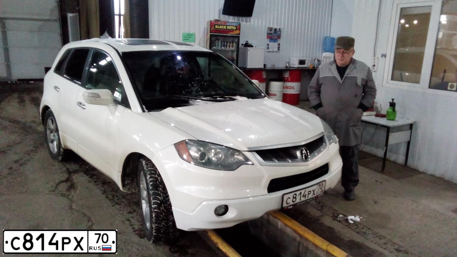 Фото автомобиля ACURA RDX, 2008 — госномер Е999ЕС70. Цвет: Белый