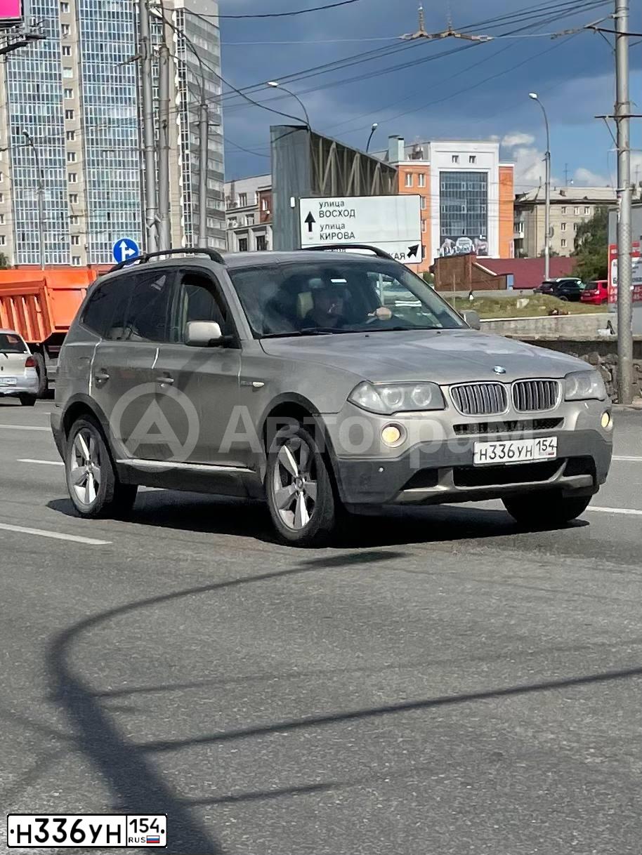 Фото автомобиля BMW X3, 2007 — госномер Н320АР70. Цвет: СЕРЫЙ