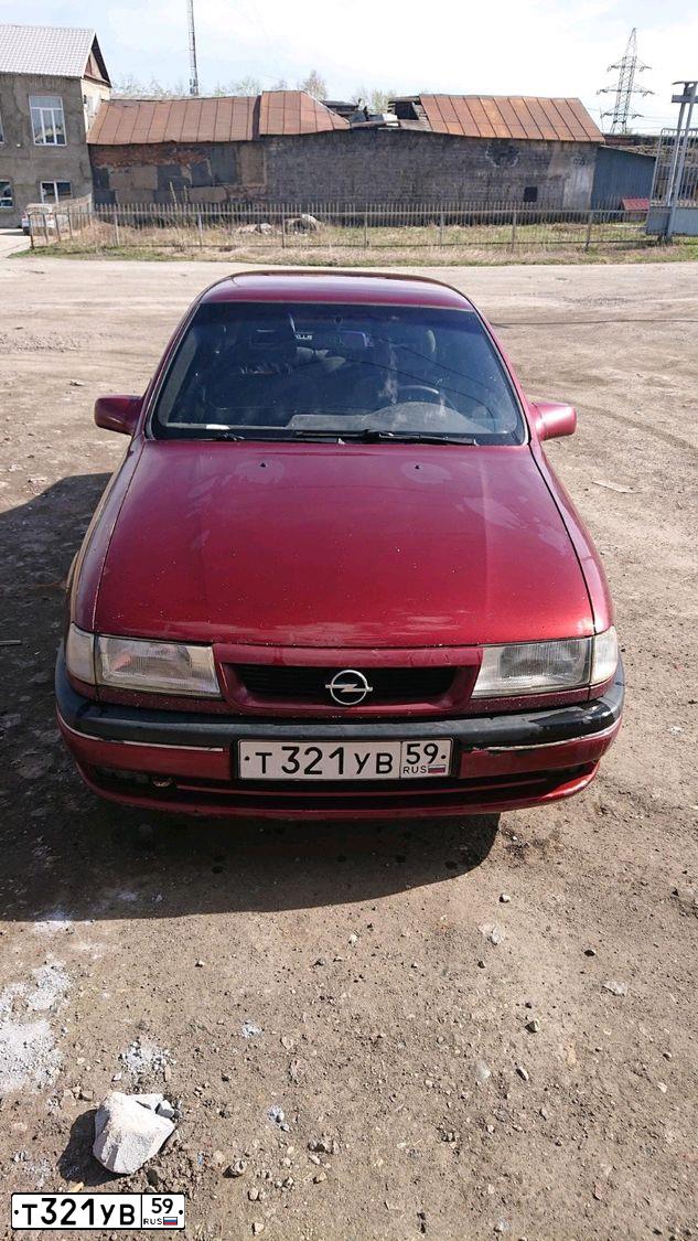 Фото автомобиля OPEL VECTRA, 1994 — госномер Т321УВ59. Цвет: ТЕМНО-КРАСНЫЙ