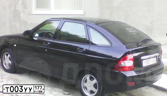 Фото автомобиля MAZDA 3, 2007 — госномер М803РС124. Цвет: ЧЕРНЫЙ