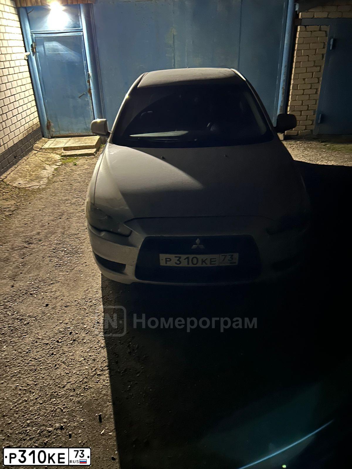 Фото автомобиля MITSUBISHI LANCER, 2008 — госномер Р310КЕ73. Цвет: СЕРЕБРИСТЫЙ