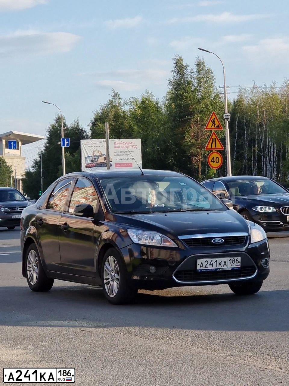 Фото автомобиля FORD FOCUS, 2008 — госномер А241КА186. Цвет: ЧЕРНЫЙ