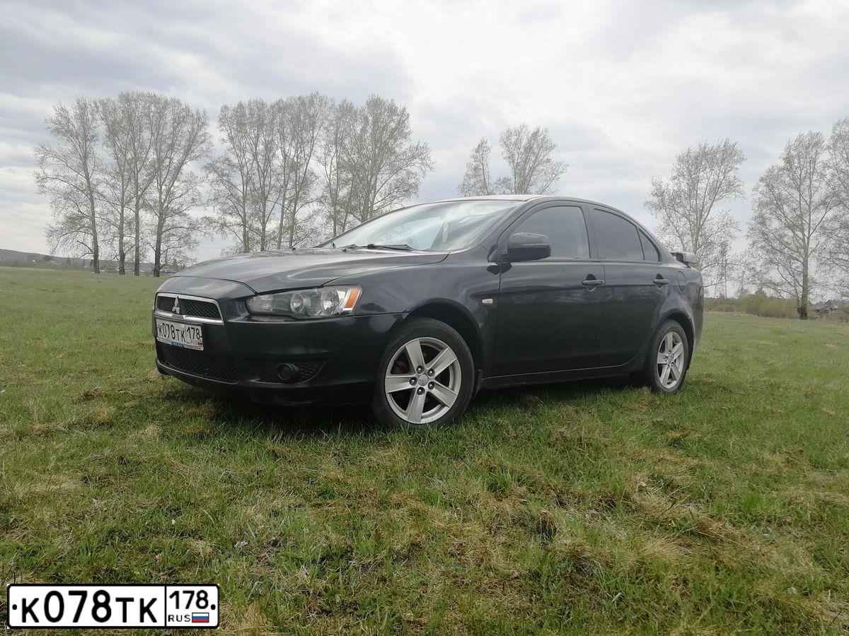 Фото автомобиля MITSUBISHI LANCER, 2007 — госномер К078ТК178. Цвет: ЧЕРНЫЙ