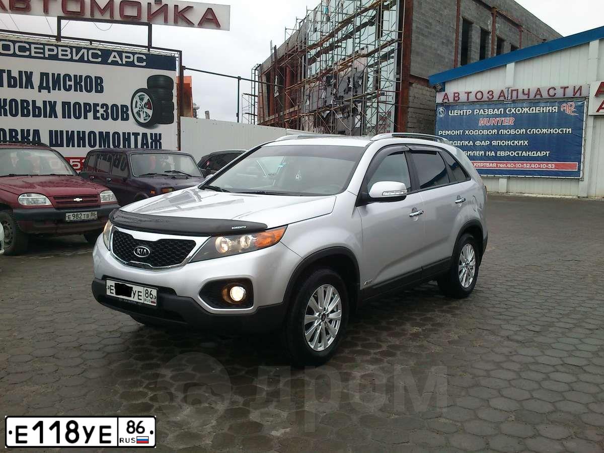 Фото автомобиля HONDA CR-V, 2012 — госномер Е118УЕ86. Цвет: СЕРО-КОРИЧНЕВЫЙ