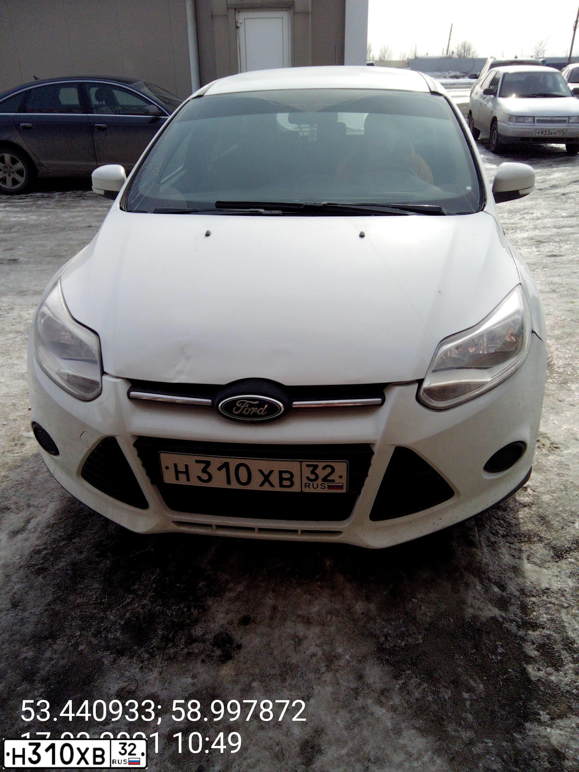 Фото автомобиля FORD FOCUS, 2013 — госномер А117ВЕ774. Цвет: Белый