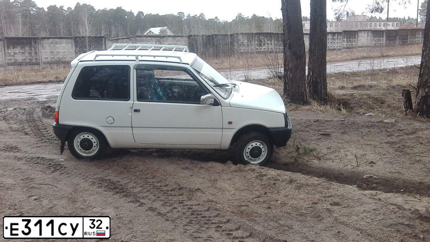 Фото автомобиля SEAZ OKA, 2006 — госномер Е311СУ32. Цвет: Белый