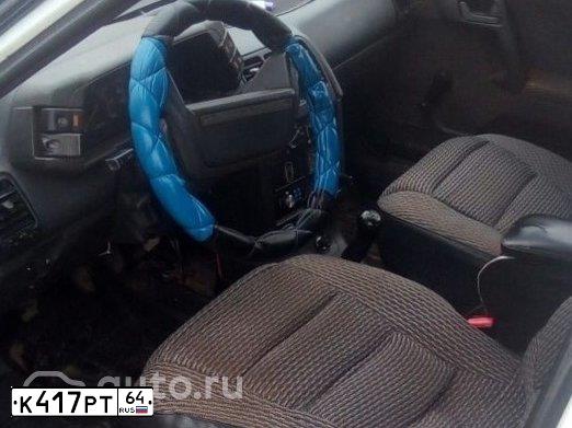 Фото автомобиля LADA 2110 LADA, 1999 — госномер К145РХ64. Цвет: ЖЕЛТО-ЗЕЛЕНЫЙ