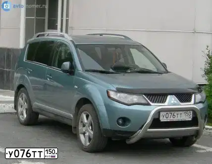 Фото автомобиля MITSUBISHI OUTLANDER, 2008 — госномер М127УМ124. Цвет: ЗЕЛЕНЫЙ(СВЕТЛО-СЕРО-ЗЕЛЕНЫЙ)
