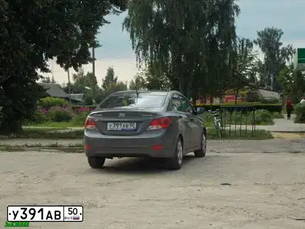 Фото автомобиля HYUNDAI SOLARIS, 2013 — госномер У182АВ750. Цвет: СЕРЫЙ ТЕМНЫЙ