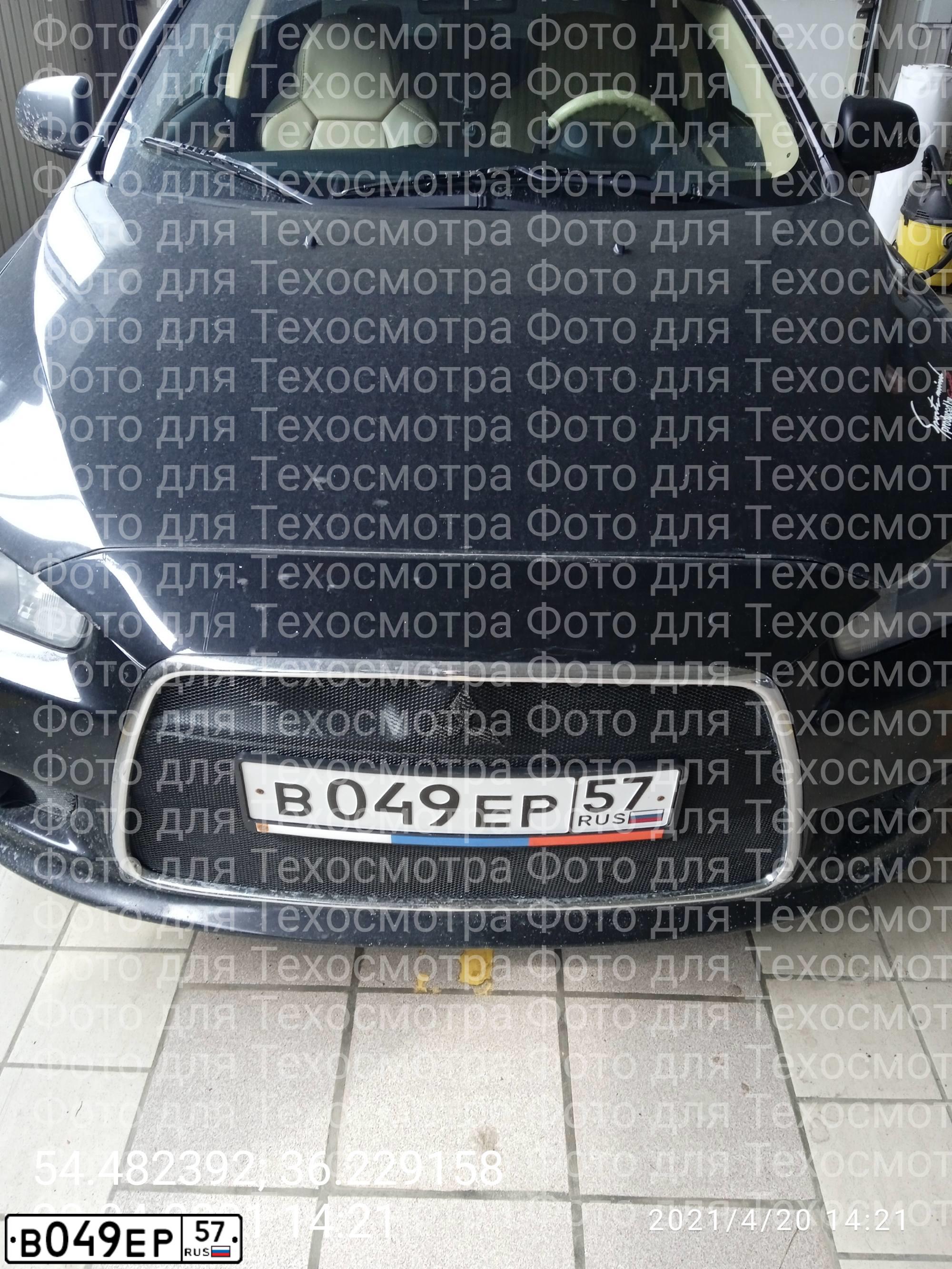 Фото автомобиля MITSUBISHI LANCER, 2012 — госномер В049ЕР57. Цвет: ЧЕРНЫЙ