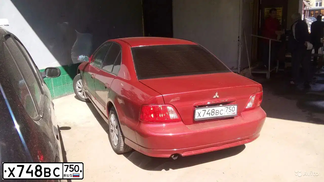 Фото автомобиля MITSUBISHI GALANT, 2003 — госномер Х748ВС750. Цвет: ВИШНЕВЫЙ