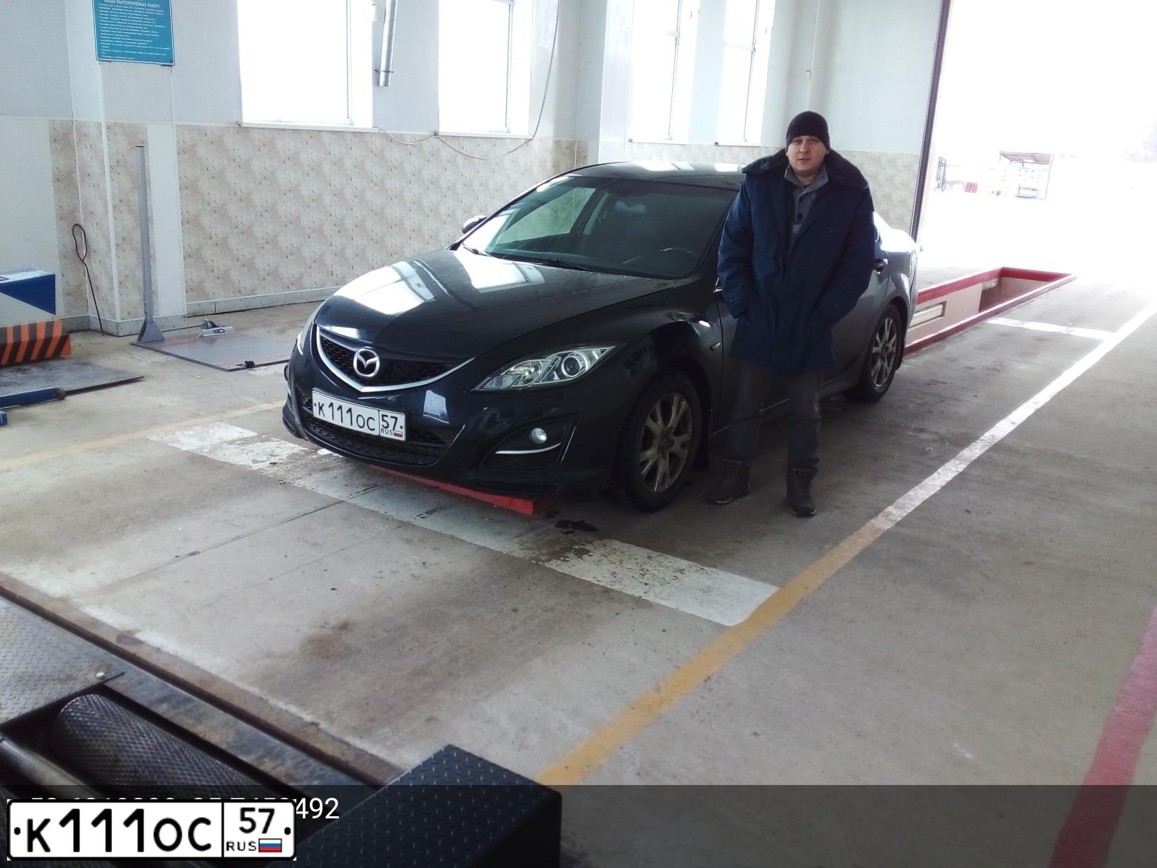 Фото автомобиля MAZDA A 6, 2010 — госномер К111ОС57. Цвет: ЧЕРНЫЙ