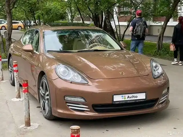 Фото автомобиля PORSCHE PANAMERA, 2010 — госномер М532ТО134. Цвет: СВЕТЛО КОРИЧНЕВЫЙ