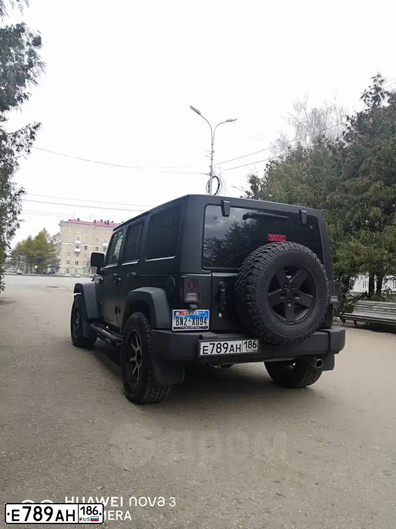 Фото автомобиля JEEP WRANGLER, 2011 — госномер О825ЕР550. Цвет: КРАСНЫЙ