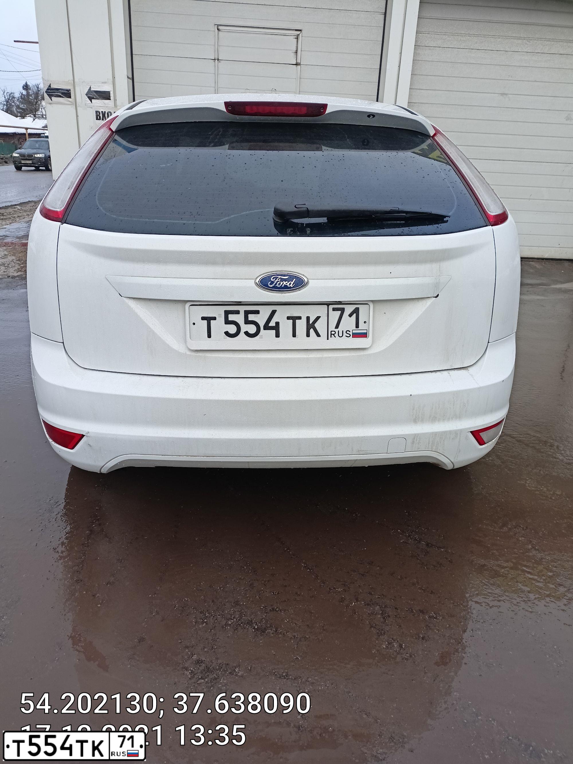 Фото автомобиля FORD FOCUS, 2009 — госномер Т554ТК71. Цвет: Белый