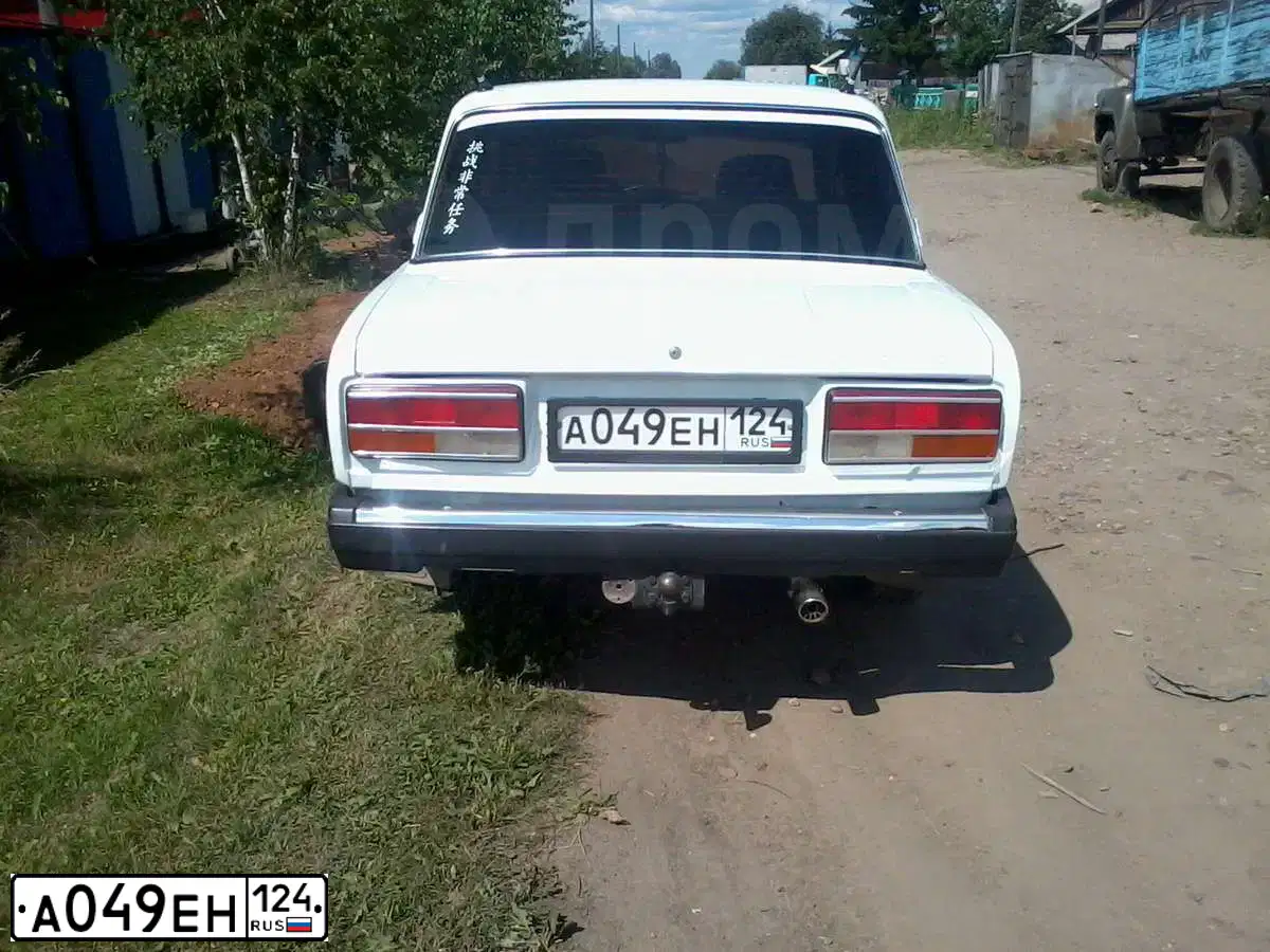 Фото автомобиля LADA 2107, 2009 — госномер А049ЕН124. Цвет: ЯРКО-БЕЛЫЙ