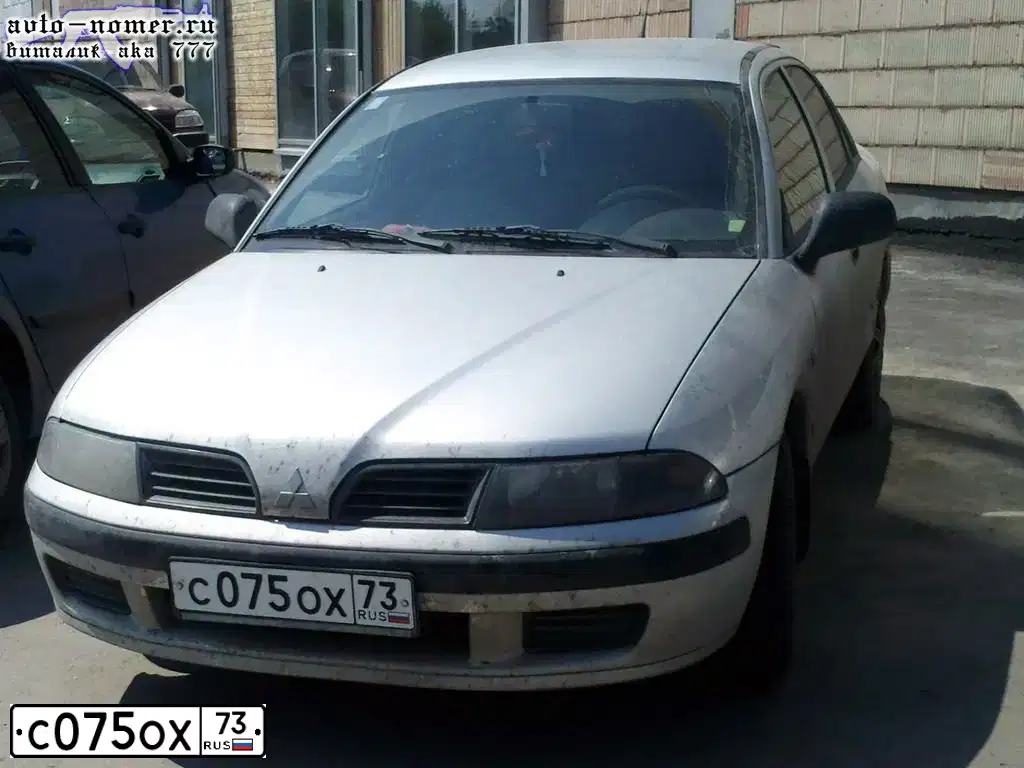 Фото автомобиля MITSUBISHI CARISMA, 2001 — госномер С075ОХ73. Цвет: СЕРЕБРИСТЫЙ