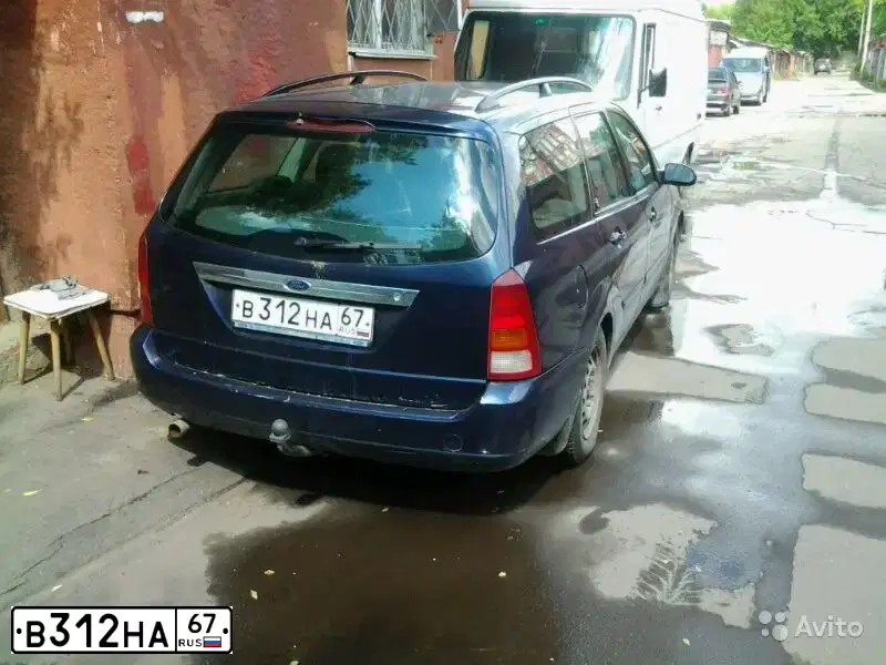 Фото автомобиля FORD FOCUS, 1999 — госномер В312НА67. Цвет: СИНИЙ (ТЕМНО-СИНИЙ)