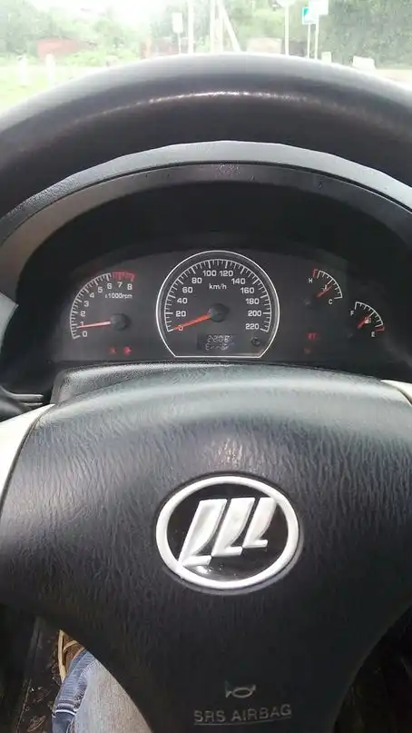 Фото автомобиля LIFAN LIFAN 214802, 2008 — госномер Е533ВУ11. Цвет: ЧЕРНЫЙ