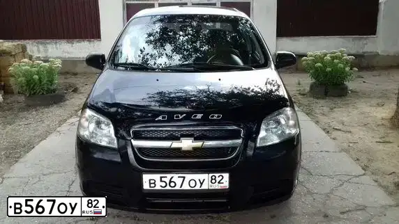 Фото автомобиля CHEVROLET AVEO, 2010 — госномер В567ОУ82. Цвет: ЧЕРНЫЙ