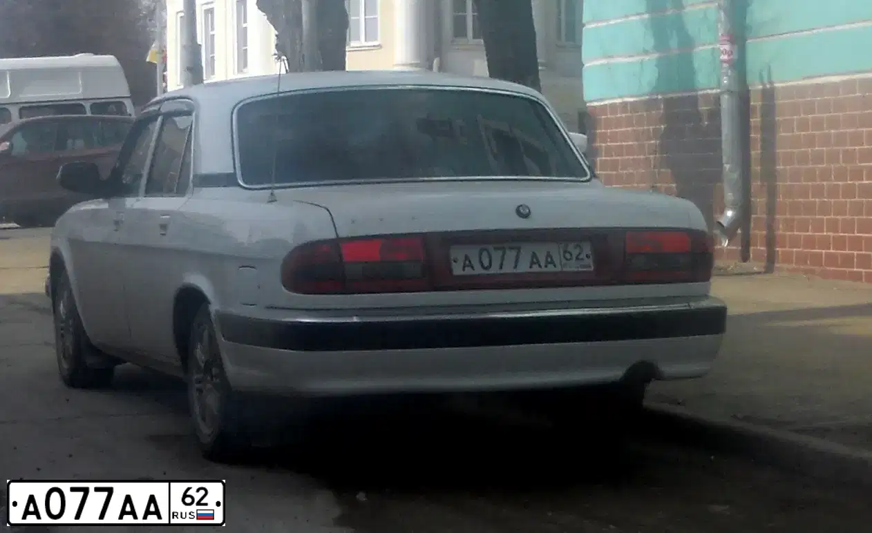 Фото автомобиля GAZ 3110 WOLGA, 2005 — госномер А077АА62. Цвет: БЕЛЫЙ