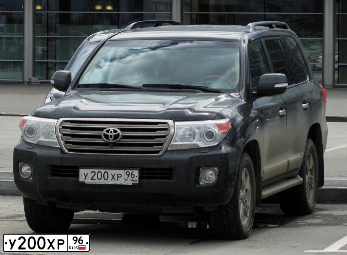 Фото автомобиля TOYOTA LANDCRUISER 200, 2012 — госномер Н963НМ30. Цвет: ЧЕРНЫЙ