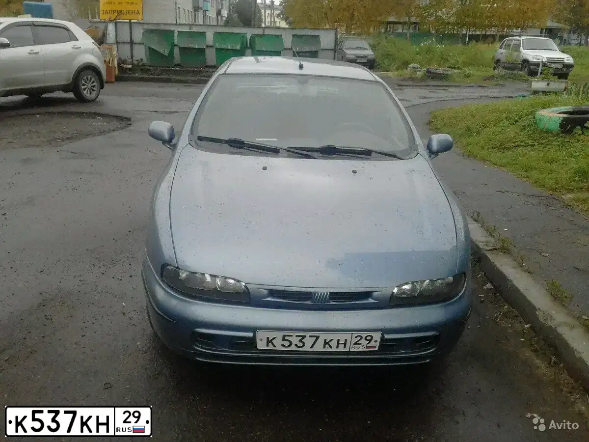 Фото автомобиля FIAT BRAVA / BRAVO, 1999 — госномер М694ОУ29. Цвет: СИНИЙ (ГОЛУБОЙ)