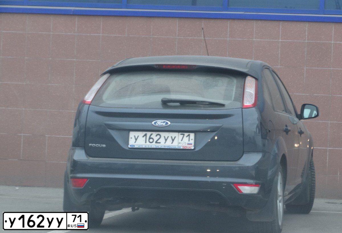 Фото автомобиля FORD FOCUS, 2011 — госномер У162УУ71. Цвет: ТЕМНО-СЕРЫЙ