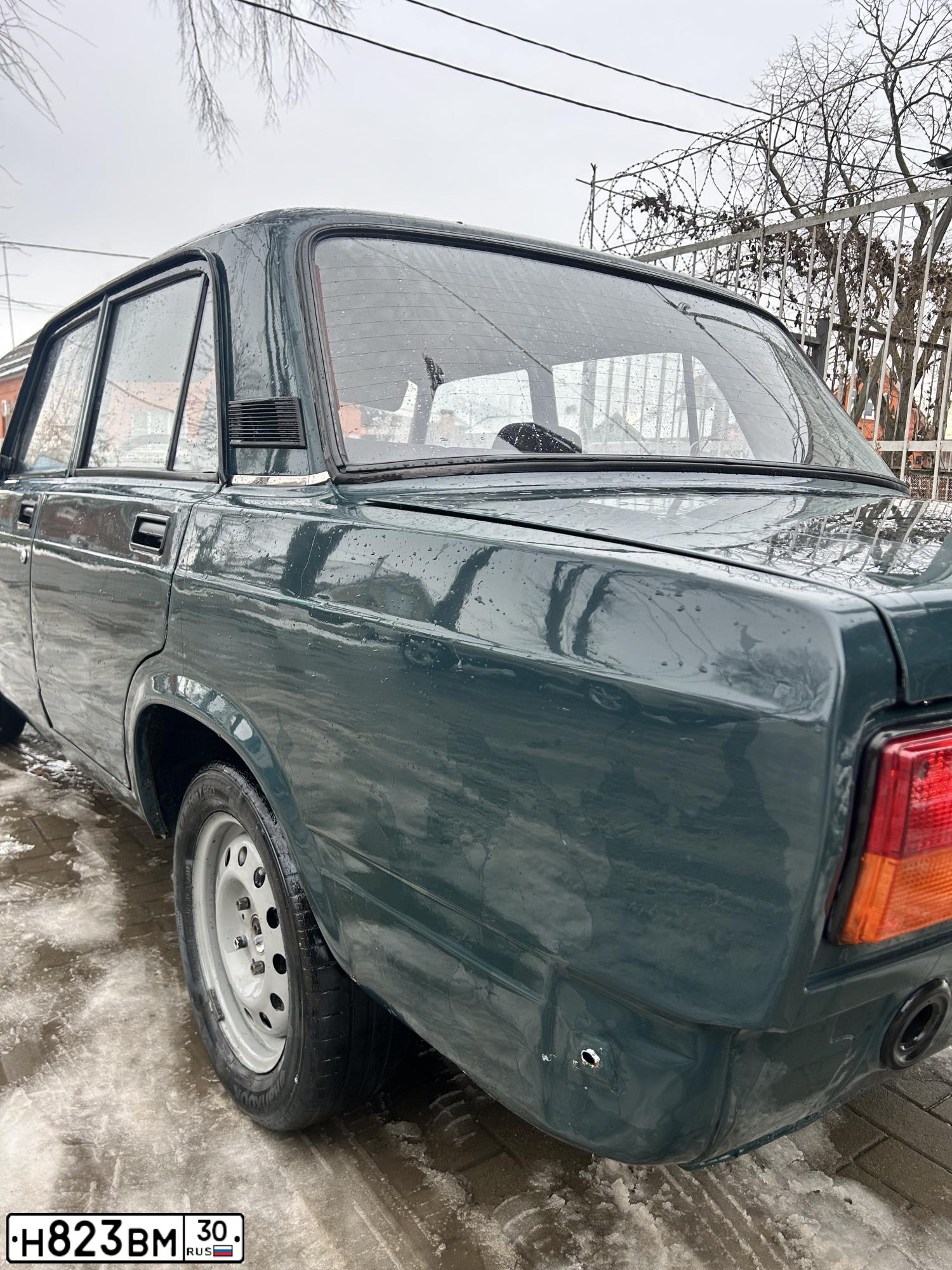 Фото автомобиля LADA 2107 LADA, 2003 — госномер Н823ВМ30. Цвет: Сине-зеленый