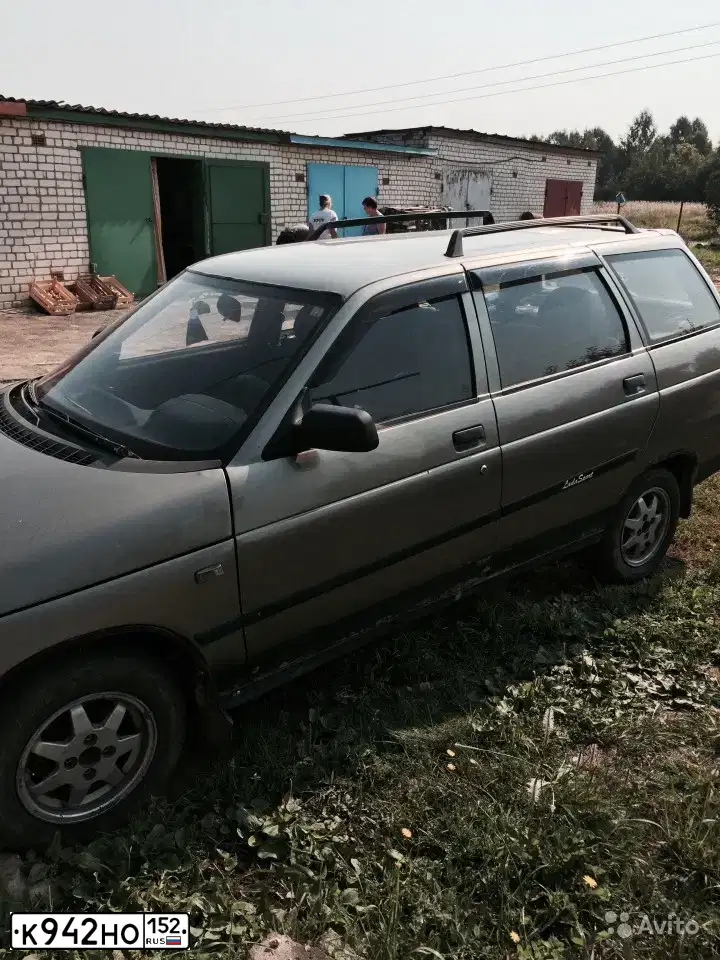 Фото автомобиля LADA 2111, 2001 — госномер К942НО152. Цвет: СЕРО-ЗЕЛЕНЫЙ