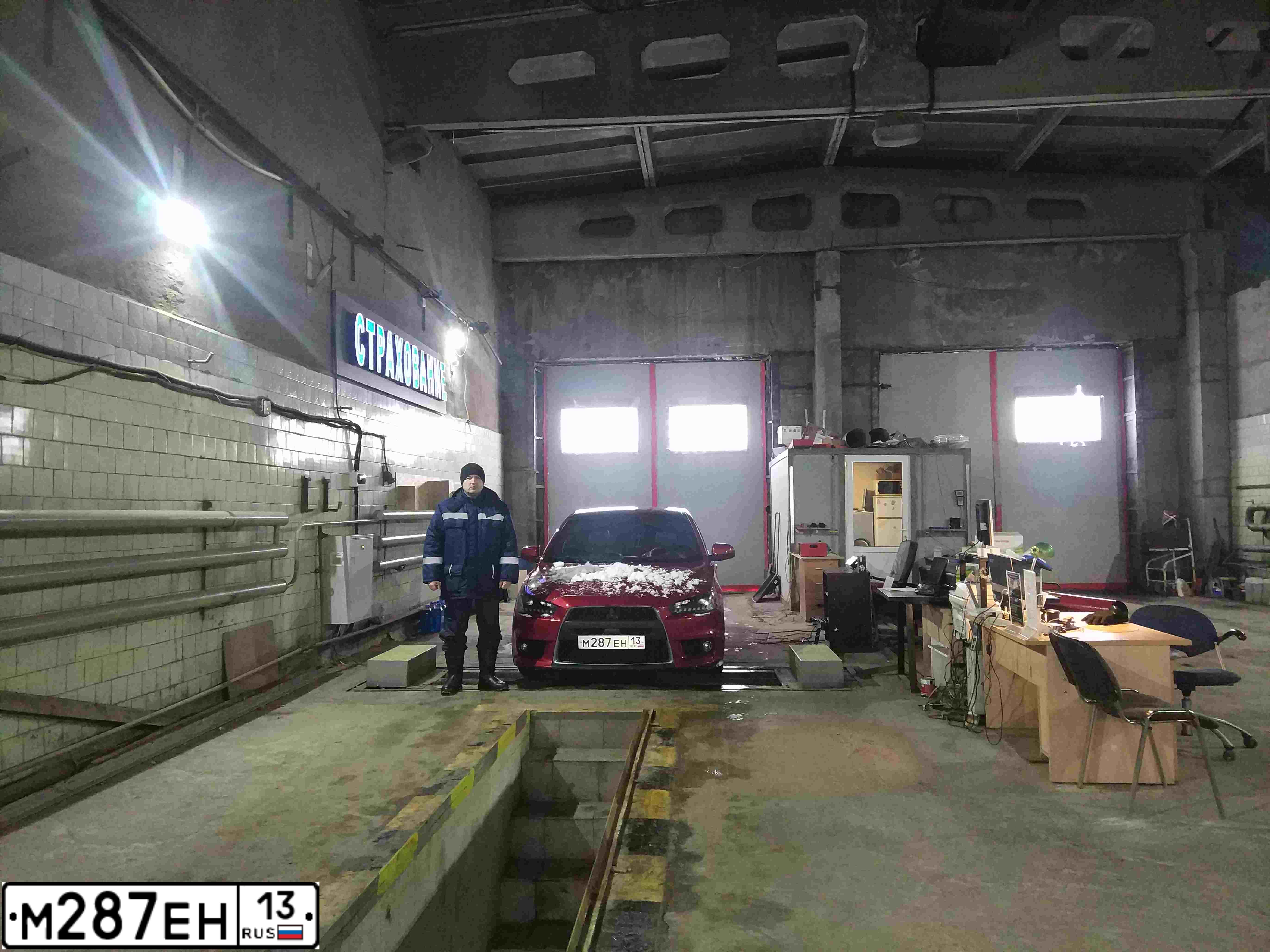 Фото автомобиля MITSUBISHI LANCER, 2007 — госномер О212ОХ797. Цвет: Красный