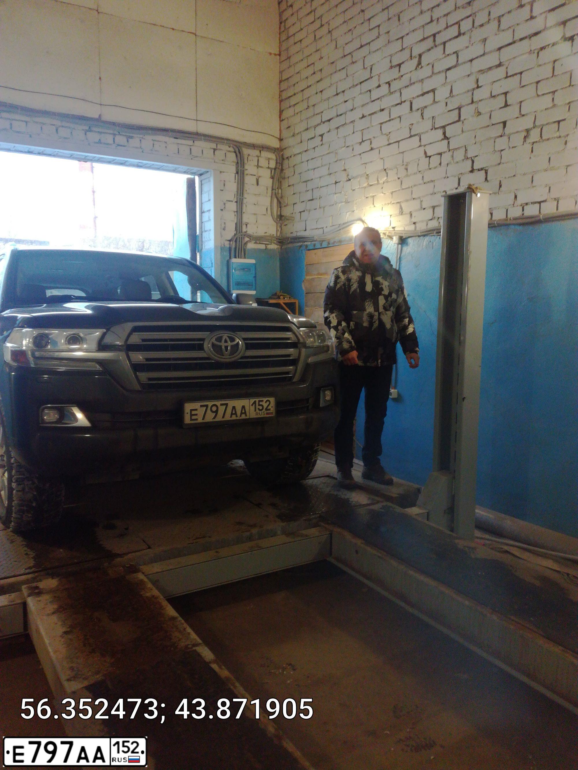 Фото автомобиля MITSUBISHI L 200, 2010 — госномер Е797АА152. Цвет: Коричневый